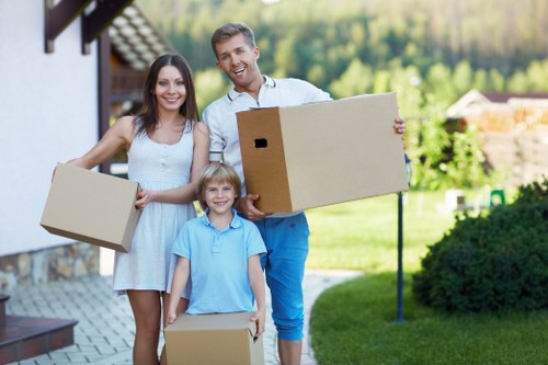 Professional movers handling furniture during a Worcesterpark house move